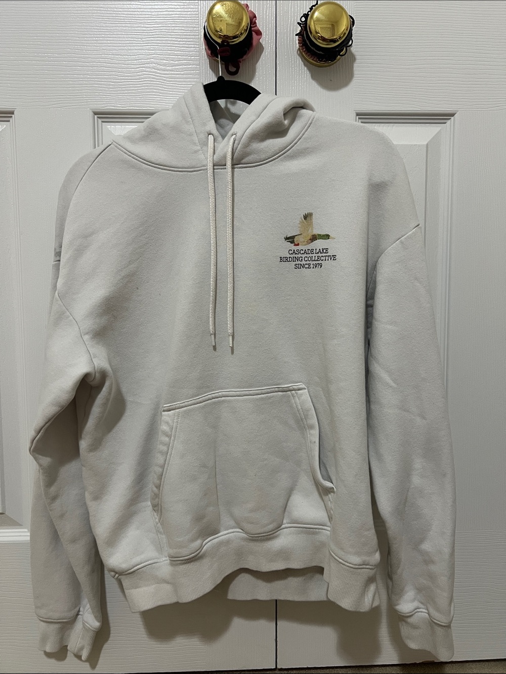 H&M Cream Hoodie with Small Bird Graphic